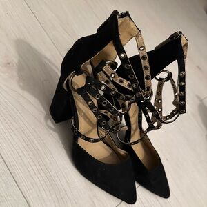 Hooked  black and gold heels